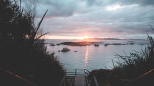 picturesque endless sea under sunset sky